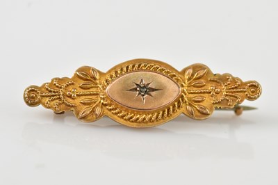 Lot 216 - A Victorian 9ct gold mourning bar brooch set...