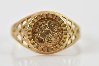 Lot 676 - A 9ct gold ring set with a sovereign effect St...