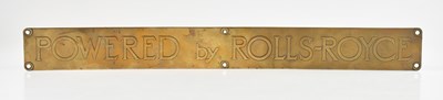 Lot 1198 - A vintage brass advertising sign, 'Powered by...