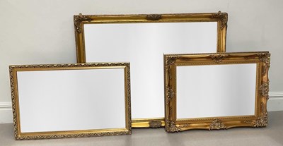 Lot 1022 - Three modern gilt framed rectangular wall...