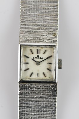 Lot 1025 - OMEGA; a 1970s lady's 9ct gold cased...