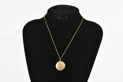 Lot 375 - A 9ct yellow gold locket, with chased floral...