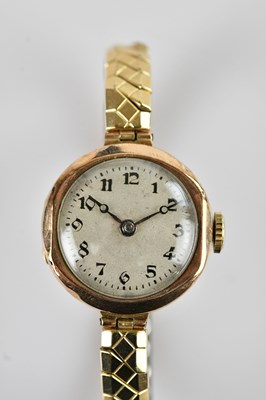 Lot 1081 - A lady's 9ct gold cased wristwatch, the dial...