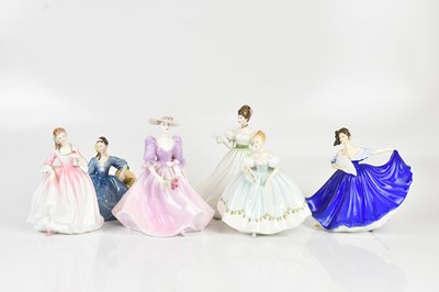 Lot 1429 - ROYAL DOULTON; a collection of five figures...
