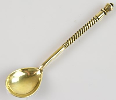 Lot 198 - A Russian silver gilt and niello coffee spoon,...