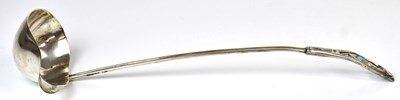 Lot 550 - An Arts and Crafts silver-plated ladle with a...