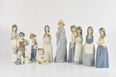 Lot 1432 - NAO; a collection of eleven figures including...