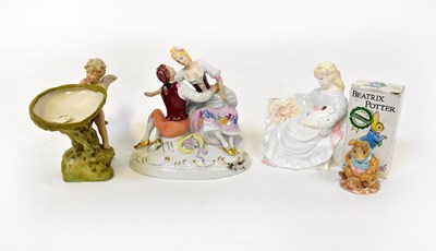 Lot 667 - Two Royal Dux figures, comprising a seated...