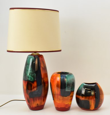 Lot 181 - POOLE POTTERY; three items decorated in the...