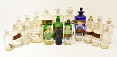 Lot 304 - Twenty-four various chemist apothecary glass...