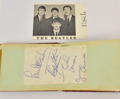 Lot 357 - THE BEATLES; an autograph book containing the...