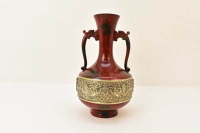 Lot 214 - A 20th century Oriental metal vase, with two...