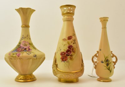 Lot 146 - ROYAL WORCESTER; three blush ivory vases, each...