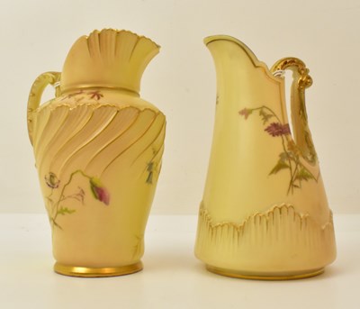 Lot 147 - ROYAL WORCESTER; two blush ivory jugs, both...