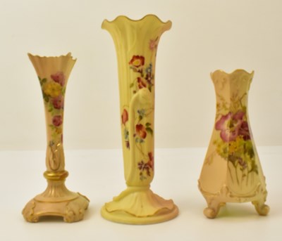 Lot 144 - ROYAL WORCESTER; three blush ivory posy vases,...