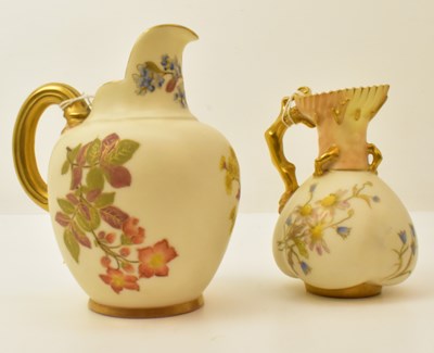 Lot 148 - ROYAL WORCESTER; two blush ivory ewer-style...