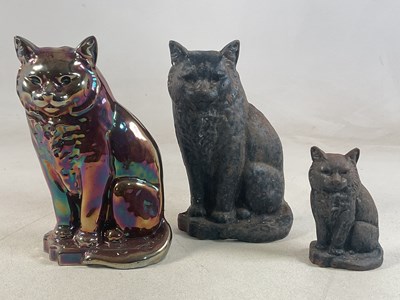 Lot 151 - Two cast iron doorstops in the form of seated...