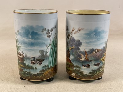 Lot 280 - A pair of French porcelain cylindrical vases...