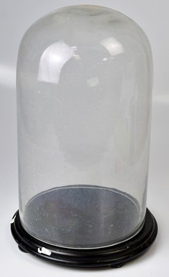 Lot 278 - A heavy gauge circular glass dome, on...