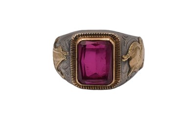 Lot 584 - A white and yellow metal ruby signet ring,...