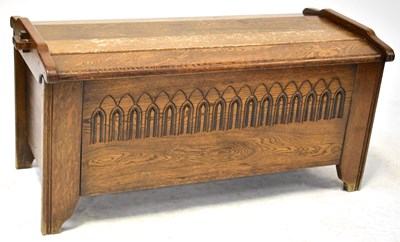 Lot 51 - An early 20th century oak coffer, with egg and...