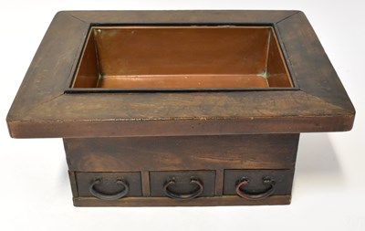 Lot 67 - A Japanese hibachi cooking table, with three...