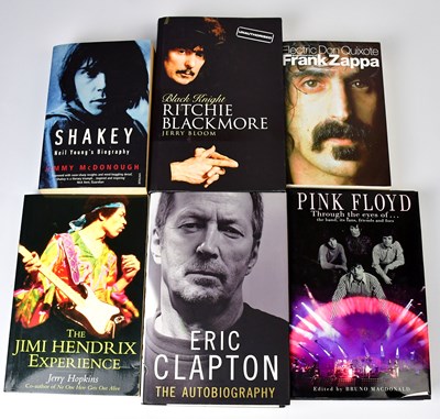 Lot 453 - Two boxes of rock and pop related books, to...