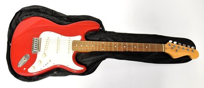 Lot 468 - An electric six string guitar, in soft carry...