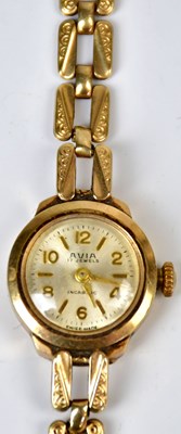 Lot 889 - AVIA; a ladies' 9ct yellow gold cocktail watch,...
