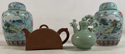 Lot 130 - A pair of Famille Rose style ginger jars,...