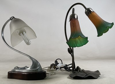 Lot 611 - A table lamp in the form of flowering pond...