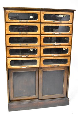 Lot 57 - An early 20th century haberdashery cabinet,...