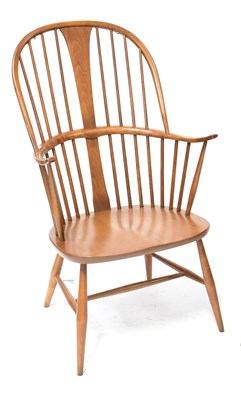 Lot 7 - ERCOL; a stained beech Windsor-type armchair,...