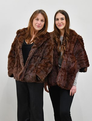 Lot 1384 - A short red brown mink fur jacket and a...