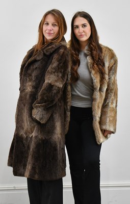 Lot 1389 - A short light brown rabbit fur jacket and a...