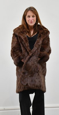 Lot 1365 - A short dark red Russian squirrel jacket with...