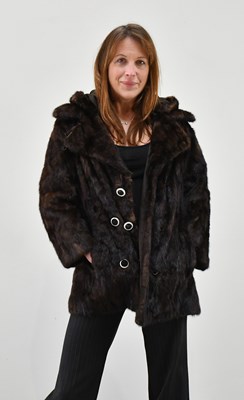 Lot 1370 - A dark brown mink paw fur jacket,...