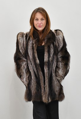 Lot 1371 - A short Canadian racoon fur jacket, fully...