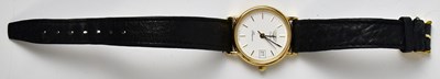 Lot 890 - LONGINES; a ladies' wristwatch, the white...