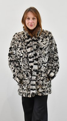 Lot 1327 - A short chinchilla rex reversible jacket, with...
