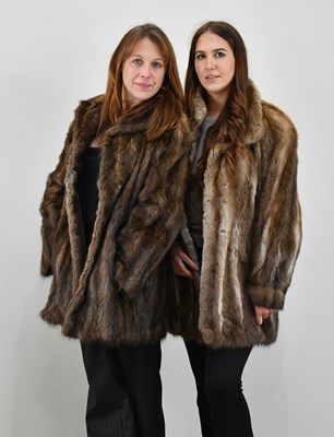 Lot 1358 - Two short musquash mink fur jackets (2).