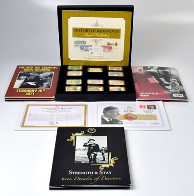 Lot 658 - A collection of commemorative coins and ingots,...