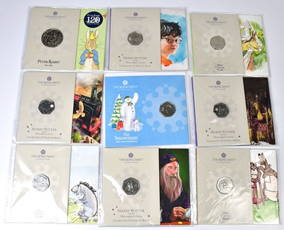 Lot 640 - ROYAL MINT; eight commemorative 50p coins...