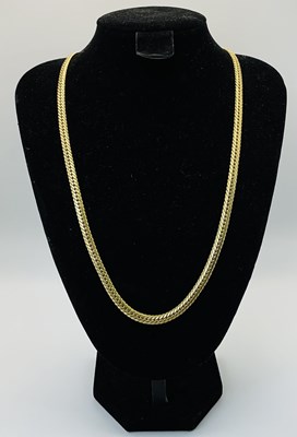 Lot 508 - A yellow metal flat link chain, unmarked,...