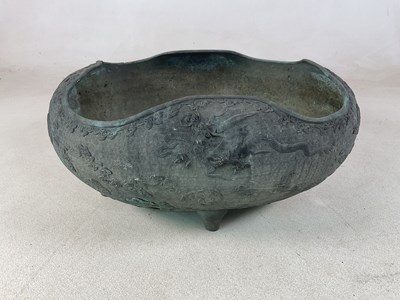 Lot 14 - A Chinese late 19th century lead/copper alloy...