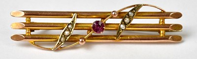 Lot 810 - A 9ct yellow gold three-bar brooch set with...