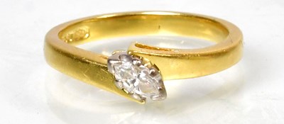 Lot 761 - An 18ct yellow gold diamond solitaire ring set...