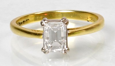 Lot 760 - An 18ct yellow gold diamond solitaire ring set...