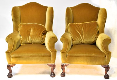 Lot 41 - A pair of early 20th century wingback...