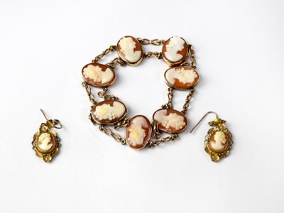 Lot 1053 - A yellow metal cameo bracelet and a pair of...